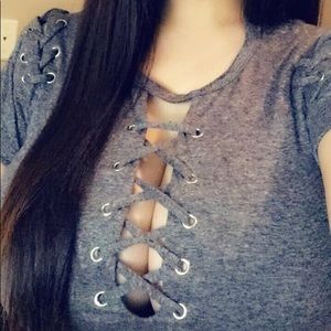 Lace up front crisscrossing body suit